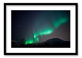 Aurora Borealis curtains rippling in the sky