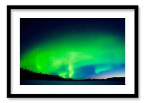 Intense display of Northern Lights at morning dawn