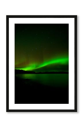 Dark night sky Northern Lights illuminated