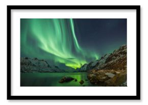 Aurora Borealis reflected between two fjords in Tromsø