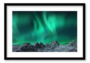 Aurora borealis above snowy islands