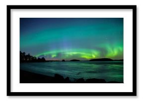 Northern lights dancing over frozen lake in spring