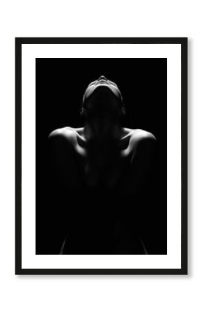 Nude Woman silhouette in the dark