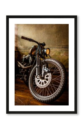 Big wheeled custom old motorcycle. Vintage cafe racer bike. Wall art. Steampunk. 