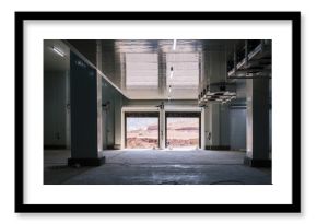 Interior of spacious illuminated industrial building