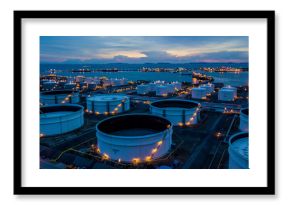 Aerial view oil terminal is industrial facility for storage of oil and petrochemical products ready for transport to further storage facilities.