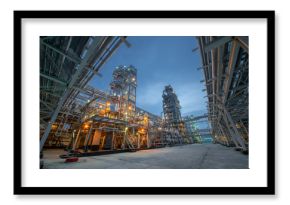 view of metal pipes of industrial plant outdoor at night 