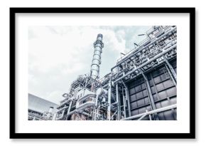 Industrial zone,The equipment of oil refining,Close-up of industrial pipelines of an oil-refinery plant,Detail of oil pipeline with valves in large oil refinery.