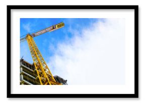 construction site and yellow crane on the background blue sky, panoramic mock-up