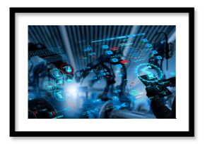 Factory Female Industrial Engineer working with automation robot arms machine in intelligent factory industrial on real time monitoring system software.Digital future manufacture.