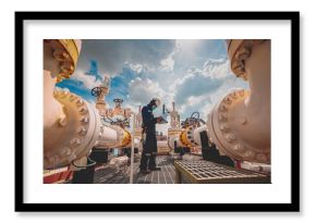 Male worker inspection at steel long pipes and pipe elbow in station oil factory during refinery valve of visual check record pipeline tank oil and gas
