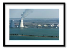 Russia - 06 June 2018: Aerial view of rostov nuclear power plant with cooling towers and smoke, Volgograd oblast, Russia.