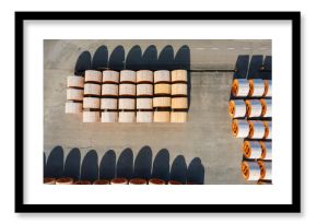 Aerial View of Neatly Arranged Cable Reels in an Industrial Yard