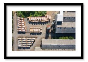 Aerial view of cable reels factory with organized storage