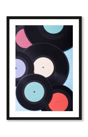 Music records on wooden background. Retro music concept