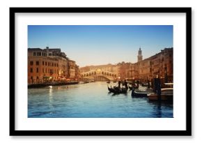 Rialto Bridge and gondolas  in Venice.