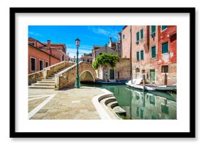 Venice cityscape, water canal, bridge and traditional buildings.