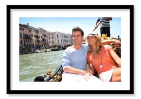 Couple in Venice having a Gondola ride on canal grande