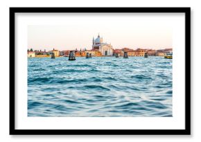 Sunset view on La Giudecca island with basilica del Redentore on the sunset in Venice. General plan with copy space
