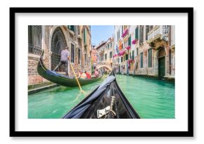 Gondola ride through the canals of Venice, Italy