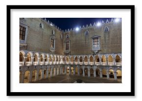 Courtyard inside the Doges palace at night in Venice, Italy.