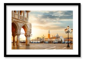 Venice postcard. World famous Venice landmarks. St. Mark's San Marco square with San Giorgio Maggiore church during amazing sunrise. Tourism and travel concept in Italy.