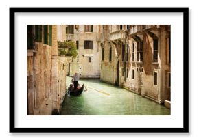 Gondola on canal in Venice