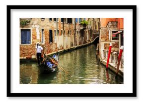 Venice, Italy - Gondolier and historic tenements