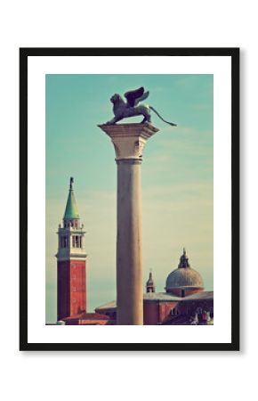 Winge lion on marble column in Venice, Italy.