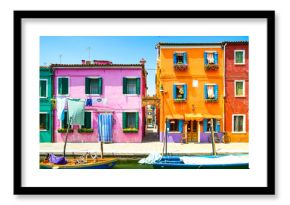 Venice landmark, Burano island canal, colorful houses and boat,