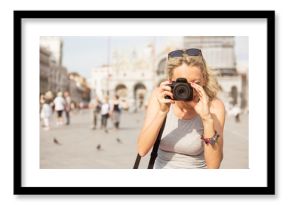 Tourist taking photos in Venice