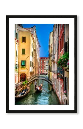 Beautiful scene with traditional gondola and canal in Venice, Italy
