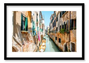 Small romantic water canal in Castello region in Venice