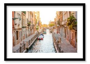 Small romantic water canal in Dorsoduro region in Venice