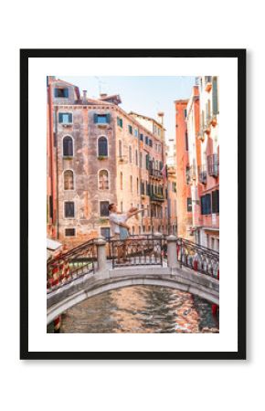 Romantic couple on honeymoon travel in Venice walking on bridge. Lovers romance jumping in love man and woman embracing each other. Europe summer holiday city streets, Italy.