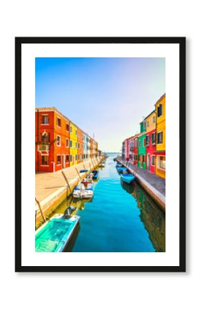 Venice landmark, Burano island canal, colorful houses and boats, Italy