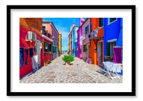 Street with colorful buildings in Burano island, Venice, Italy. Architecture and landmarks of Venice, Venice postcard