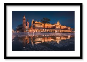 The main square in Krakow with a view of the cloth hall, St. Mary's Basilica in a natural mirror. Rynek główny w krakowie z widokiem na sukiennice, bazylikę mariacką w naturalnym lustrze.