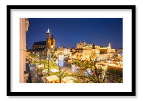 View of the Krakow Christmas Market 2024 and the historic Old Town Square, beautifully illuminated with festive lights and vibrant holiday atmosphere.