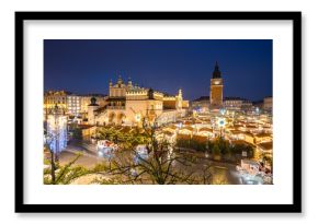 View of the Krakow Christmas Market 2024 and the historic Old Town Square, beautifully illuminated with festive lights and vibrant holiday atmosphere.