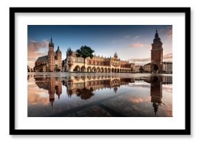 The main square in Krakow with a view of the cloth hall, St. Mary's Basilica in a natural mirror. Rynek główny w krakowie z widokiem na sukiennice, bazylikę mariacką w naturalnym lustrze.