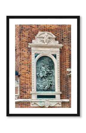 Fragment of the Church of St. Mary or the Church of the Assumption of the Blessed Virgin Mary - a Catholic church of Gothic architecture, which in 1962 received the title of a minor basilica, Krakow. 