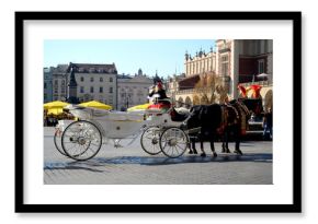 Cab on the main square - old town in Krakow, Poland