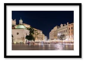 Nocny widok na Rynek Główny w Krakowie. Kościół Świętego Wojciecha. Ulica Grodzka. Polska 