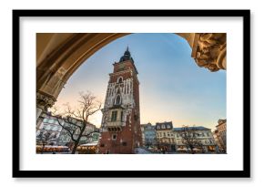 Town Hall Tower (Wieża Ratuszowa) and Cloth Hall (Sukiennice Kraków) at sunse on Main Market Square in the Old Town Krakow, Poland