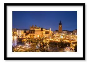 View of the Krakow Christmas Market 2024 and the historic Old Town Square, beautifully illuminated with festive lights and vibrant holiday atmosphere.