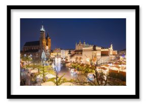 View of the Krakow Christmas Market 2024 and the historic Old Town Square, beautifully illuminated with festive lights and vibrant holiday atmosphere.