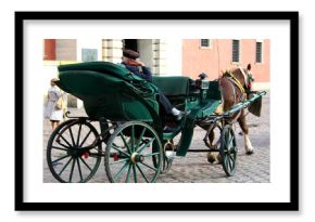 Carriage with a sleeping coachman in Warsaw Old Town