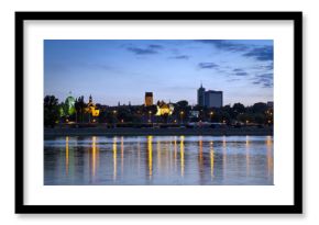 Warsaw durung sundown with reflection in Vistula river