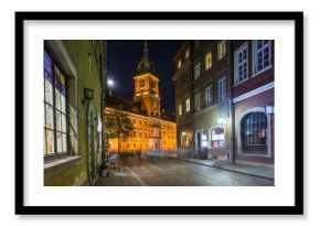 Old Town street at night with view to Royal Palace in Warsaw